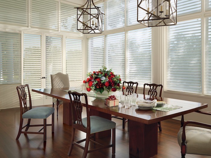 A dining room with roses.